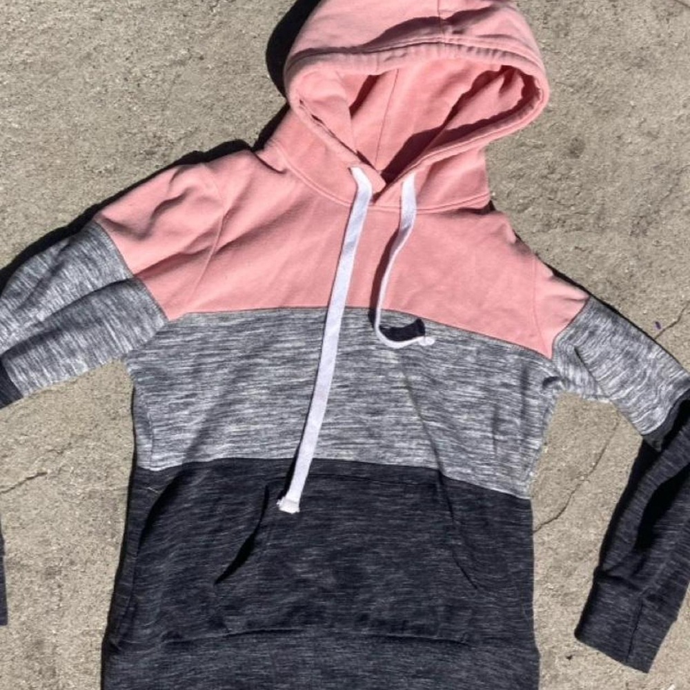 Reflex pink, gray, and black color-blocked hoodie